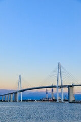 Fototapeta na wymiar 夕暮れの新湊大橋　富山県射水市　Shinminato Bridge at dusk. Toyama Prefecture Imizu city.