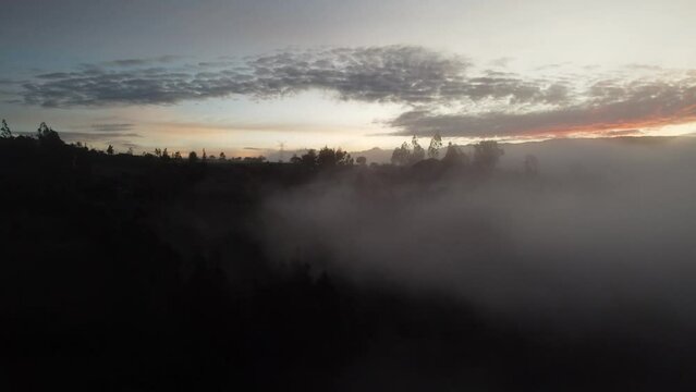 Boyaca sunrise with fog in mountains drone view