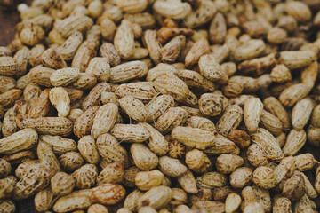 close up of a pile of peanuts