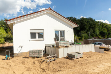 garden work at a construction site of a small family home in Germany