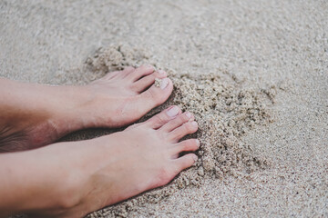feet on the beach