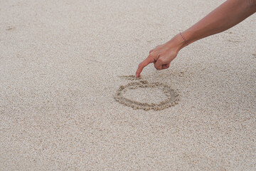 hand written on sand - Powered by Adobe