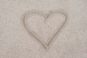 hand written on sand