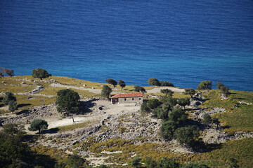 Old stone building on the cliffs of Gokceada in Turkey. 