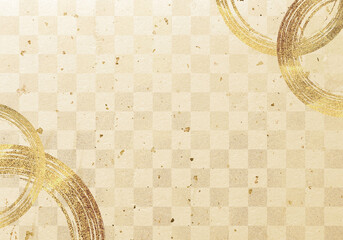 金の丸い和柄のフレームと金色の和紙の背景