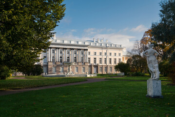 Pushkin, Saint Petersburg, Russia, 09.10.2022: View of the Catherine Palace and the statue of the Dancer in the private garden of the Catherine Park in Tsarskoye Selo on a sunny autumn day