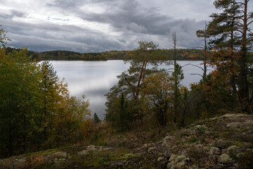 Fototapeta na wymiar View of Lake Ladoga near the village Lumivaara on a sunny autumn day, Ladoga skerries, Republic of Karelia, Russia