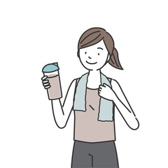 プロテインを手にするトレーニング中の女性