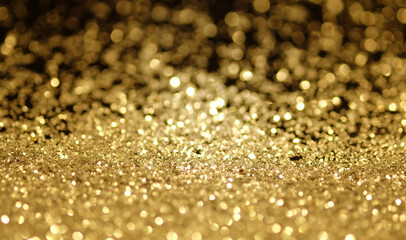 background of gold,  stardust with bokeh light background.