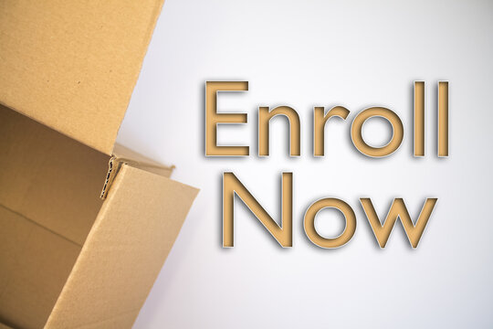 Enroll Now word with cardboard box. Brown folded card box.