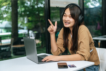 Young woman enjoy to listening music on headphone