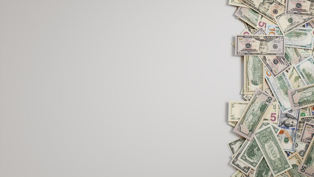 Mixed Denomination Bills Border on White Surface. Prosperity Background with copy-space.