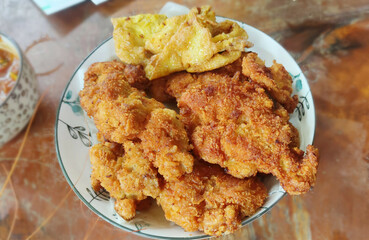 Tonkatsu Japanese Pork Cutlet with spicy sauce.