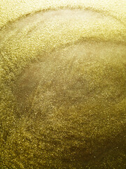 Gold dust spangled densely with fine gold-colored particles