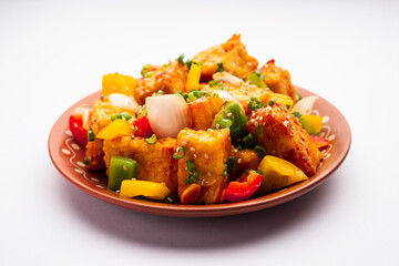 chilli paneer dry is made using cottage cheese, Indo chinese food