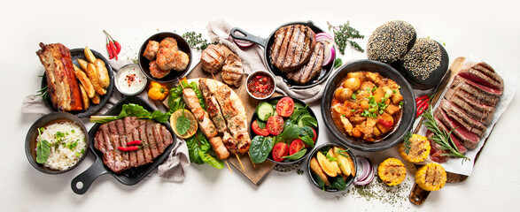 Meat dishes. Plates of various meat
