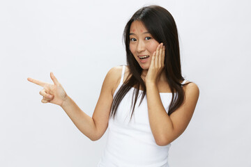 Asian woman hand signals, finger pointing facial skin problems, acne and inflammation, red rash and...