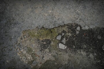 shadow of the old gray cement wall surface with cracks