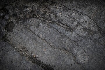 shadow of the old gray cement wall surface with cracks