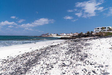 Popcorn beach and Atlantic ocean with view of nearby hotels or islands, Corralejo, Fuerteventura, Canary Islands