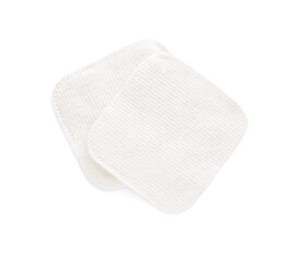 Soft clean cotton pads on white background, top view