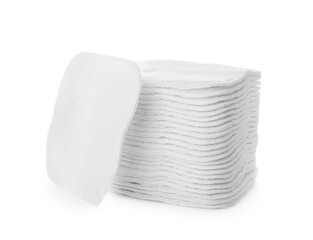 Pile of cotton pads on white background