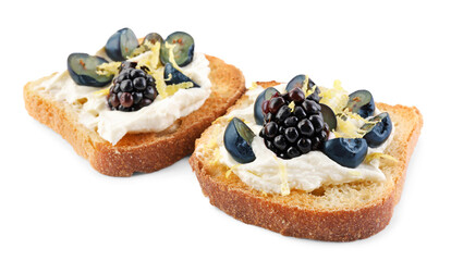 Tasty sandwiches with cream cheese, blueberries, blackberries and lemon zest on white background