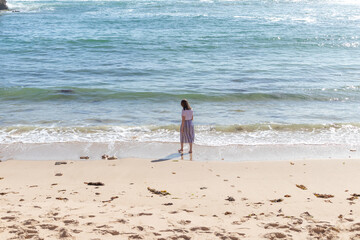 woman walking on the beach