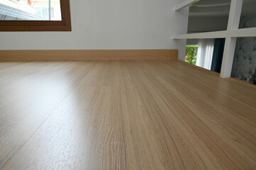 wooden floor with white handrail