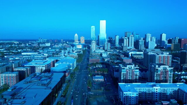Edmonton downtown flyover main downtown 104th avenue NW towards hockey arena McEwan University Norquest College capital city residential retail district studios apartments condos twilight 4k 3-3