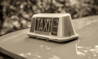 Taxi sign on a yellow cab in Funchal - Madeira, Portugal