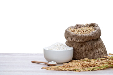 White rice grains in white bowls, white rice grains in wooden spoons, raw rice grains in hemp sacks...