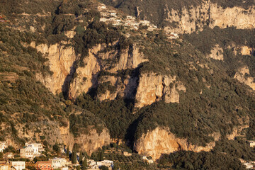 Rocky Cliffs and Mountain Landscape by the Tyrrhenian Sea. Amalfi Coast, Italy. Nature Background. Sunset
