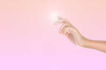 Beauty and Health theme: beautiful elegant female hand show gesture on an isolated Pink background.