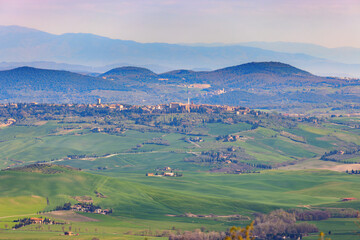View towards Pienza on a hill in the Val d'Orcia in Tuscany, Italy.