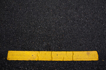 Fototapeta premium abstract Asphalt road surface with yellow line. texture for add text message or design art work. Concept logistic.