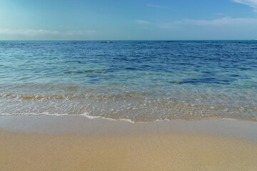 Fototapeta na wymiar minimalistic seascape in summer. beach sea and horizon. purity in nature