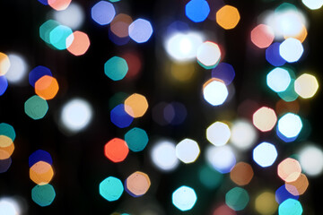 multicolored festive lights on a black background screensaver backdrop