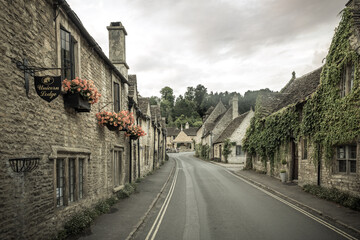 Beautiful British traditional village Castle Combe captured in a summer day in England, UK