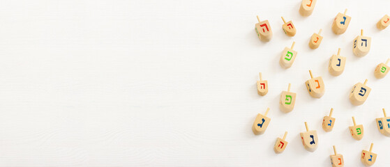 image of jewish holiday Hanukkah background of spinning tops