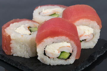 rolls with tuna and cucumber, front view, close-up