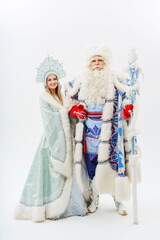 Fototapeta na wymiar a traditional Father Frost and Snow Maiden costume on a white background.