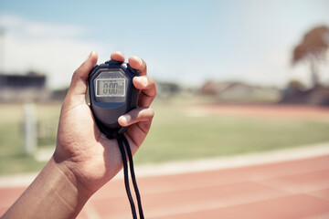 Sport, coach and closeup of hand with stopwatch for time, training and speed of athlete, runner or...