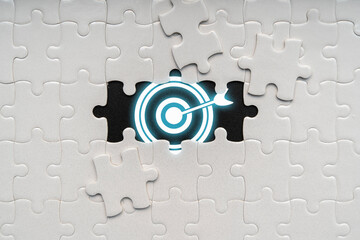White jigsaw puzzle background with target symbols. success goals set Goals that need to be added...