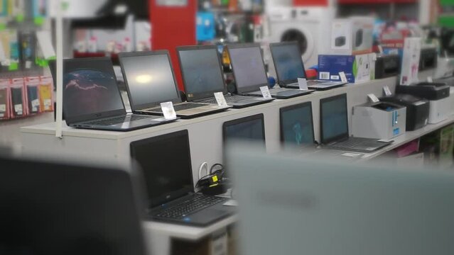 Laptops electronics for the home on the shelves in the store. Trade and Marketing