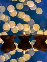 clay lamp lit with sesame oil for karthigai that purifies atmosphere