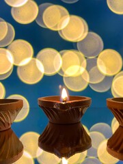 clay lamp lit with sesame oil for karthigai that purifies atmosphere
