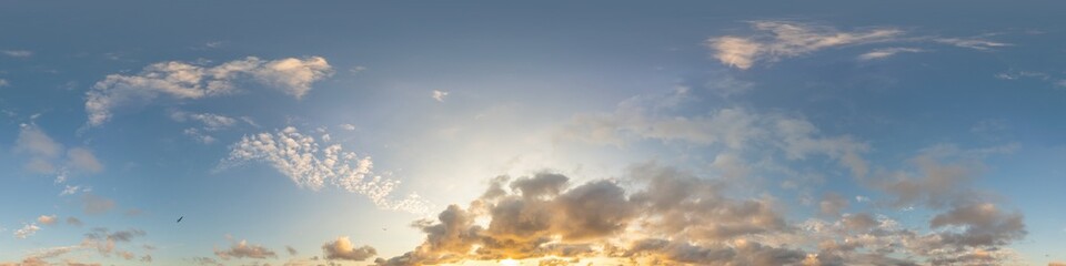 Dark blue sunset sky panorama with golden Cumulus clouds. Seamless hdr 360 panorama in spherical equirectangular format. Full zenith for 3D visualization, sky replacement for aerial drone panoramas.
