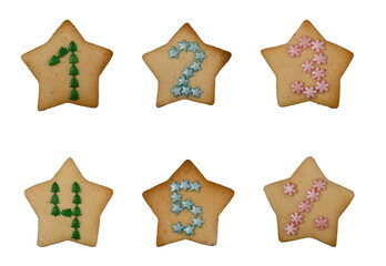 The set numerals from Christmas gingerbread decorated with confectionery. New Year's numerals made from homemade cookies.