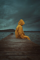 Mysterious figure with yellow coat
